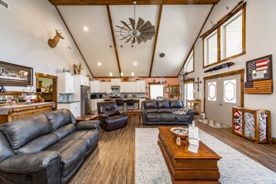 Discover your dream retreat on the picturesque shores of Greers on Thunderbird Country Club in Arkansas - for sale on GolfHomes.com, golf home, golf lot