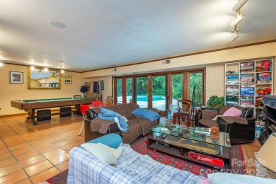A rare opportunity awaits you in this secluded gem. You can live on Biltmore Forest Country Club in North Carolina - for sale on GolfHomes.com, golf home, golf lot