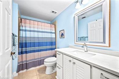 A SPECIAL UNIT WITH STUNNING LAKE VIEWS and NO FLOOD DAMAGE from on Bonita Bay West in Florida - for sale on GolfHomes.com, golf home, golf lot