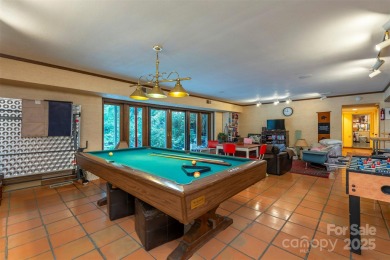 A rare opportunity awaits you in this secluded gem. You can live on Biltmore Forest Country Club in North Carolina - for sale on GolfHomes.com, golf home, golf lot