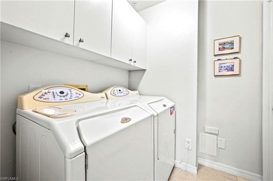 A SPECIAL UNIT WITH STUNNING LAKE VIEWS and NO FLOOD DAMAGE from on Bonita Bay West in Florida - for sale on GolfHomes.com, golf home, golf lot