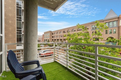 Upscale living in this end unit beauty! Views of bustling East on The UNC Finley Golf Club in North Carolina - for sale on GolfHomes.com, golf home, golf lot