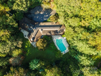 A rare opportunity awaits you in this secluded gem. You can live on Biltmore Forest Country Club in North Carolina - for sale on GolfHomes.com, golf home, golf lot