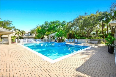 A SPECIAL UNIT WITH STUNNING LAKE VIEWS and NO FLOOD DAMAGE from on Bonita Bay West in Florida - for sale on GolfHomes.com, golf home, golf lot