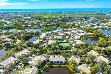 A SPECIAL UNIT WITH STUNNING LAKE VIEWS and NO FLOOD DAMAGE from on Bonita Bay West in Florida - for sale on GolfHomes.com, golf home, golf lot