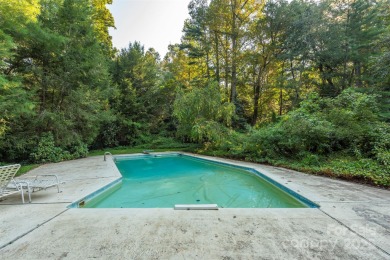 A rare opportunity awaits you in this secluded gem. You can live on Biltmore Forest Country Club in North Carolina - for sale on GolfHomes.com, golf home, golf lot