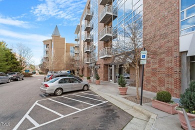 Upscale living in this end unit beauty! Views of bustling East on The UNC Finley Golf Club in North Carolina - for sale on GolfHomes.com, golf home, golf lot