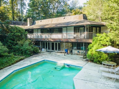 A rare opportunity awaits you in this secluded gem. You can live on Biltmore Forest Country Club in North Carolina - for sale on GolfHomes.com, golf home, golf lot