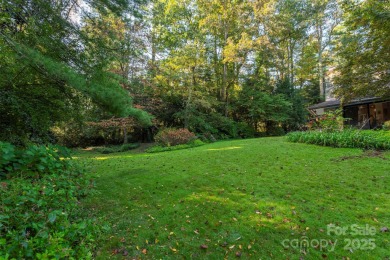 A rare opportunity awaits you in this secluded gem. You can live on Biltmore Forest Country Club in North Carolina - for sale on GolfHomes.com, golf home, golf lot