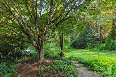 A rare opportunity awaits you in this secluded gem. You can live on Biltmore Forest Country Club in North Carolina - for sale on GolfHomes.com, golf home, golf lot