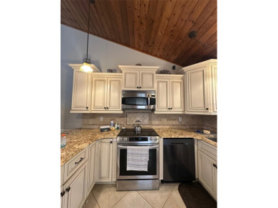 Act fast. Discover comfort, charm, and natural beauty in this on Grenelefe Golf and Tennis Resort in Florida - for sale on GolfHomes.com, golf home, golf lot