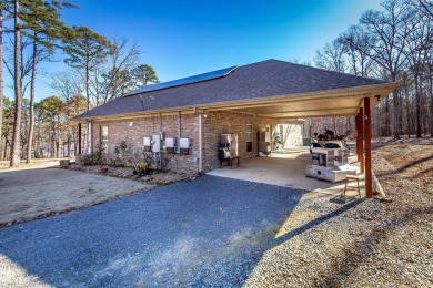 Discover your dream retreat on the picturesque shores of Greers on Thunderbird Country Club in Arkansas - for sale on GolfHomes.com, golf home, golf lot