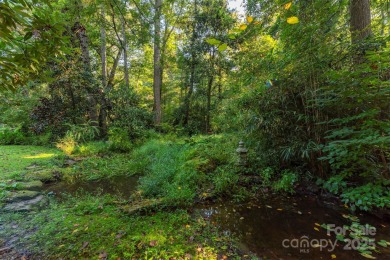A rare opportunity awaits you in this secluded gem. You can live on Biltmore Forest Country Club in North Carolina - for sale on GolfHomes.com, golf home, golf lot