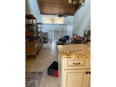Act fast. Discover comfort, charm, and natural beauty in this on Grenelefe Golf and Tennis Resort in Florida - for sale on GolfHomes.com, golf home, golf lot