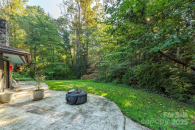 A rare opportunity awaits you in this secluded gem. You can live on Biltmore Forest Country Club in North Carolina - for sale on GolfHomes.com, golf home, golf lot
