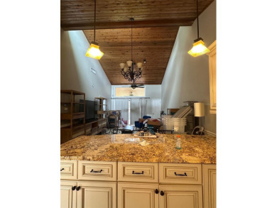 Act fast. Discover comfort, charm, and natural beauty in this on Grenelefe Golf and Tennis Resort in Florida - for sale on GolfHomes.com, golf home, golf lot