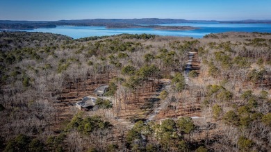 Discover your dream retreat on the picturesque shores of Greers on Thunderbird Country Club in Arkansas - for sale on GolfHomes.com, golf home, golf lot