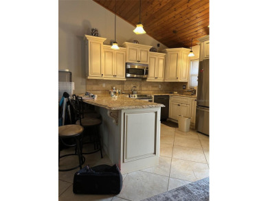 Act fast. Discover comfort, charm, and natural beauty in this on Grenelefe Golf and Tennis Resort in Florida - for sale on GolfHomes.com, golf home, golf lot