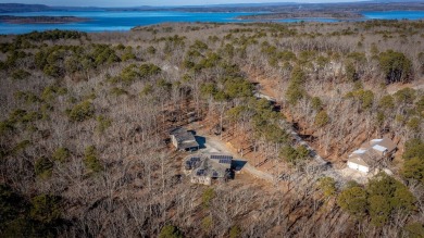 Discover your dream retreat on the picturesque shores of Greers on Thunderbird Country Club in Arkansas - for sale on GolfHomes.com, golf home, golf lot