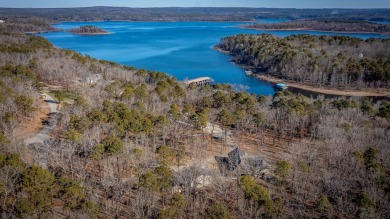 Discover your dream retreat on the picturesque shores of Greers on Thunderbird Country Club in Arkansas - for sale on GolfHomes.com, golf home, golf lot