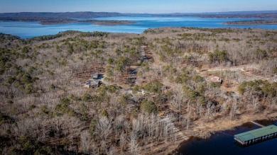 Discover your dream retreat on the picturesque shores of Greers on Thunderbird Country Club in Arkansas - for sale on GolfHomes.com, golf home, golf lot