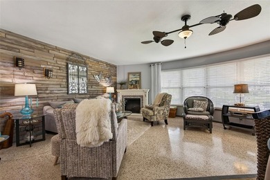 Wake up to peaceful waterfront views and glowing Gulf Coast on Jacaranda West Country Club in Florida - for sale on GolfHomes.com, golf home, golf lot