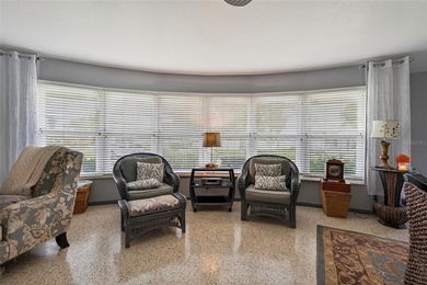 Wake up to peaceful waterfront views and glowing Gulf Coast on Jacaranda West Country Club in Florida - for sale on GolfHomes.com, golf home, golf lot