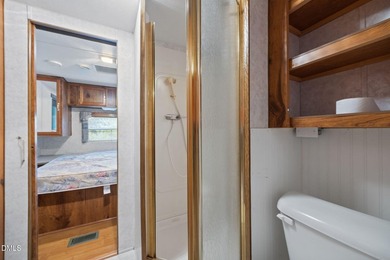 START LIVING THE LAKE LIFE NOW!! WATERFRONT GET-AWAY WITH 75 FT on River Golf and Country Club at Lake Royale in North Carolina - for sale on GolfHomes.com, golf home, golf lot