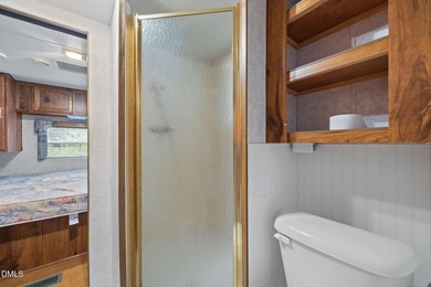 START LIVING THE LAKE LIFE NOW!! WATERFRONT GET-AWAY WITH 75 FT on River Golf and Country Club at Lake Royale in North Carolina - for sale on GolfHomes.com, golf home, golf lot