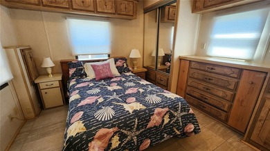 TWO BEDROOM, ONE BATHROOM MOBILE HOME IN AN ACTIVE 55+ COMMUNITY on River Run Golf Links in Florida - for sale on GolfHomes.com, golf home, golf lot