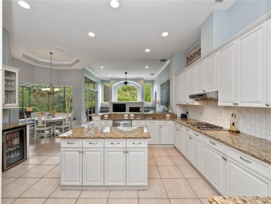 Welcome to this beautifully maintained home in the guard-gated on The Legacy Club At Alaqua Lakes in Florida - for sale on GolfHomes.com, golf home, golf lot