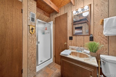 This LAKEFRONT chalet sits right on the very sought after on Innsbrook Resort Golf Course in Missouri - for sale on GolfHomes.com, golf home, golf lot
