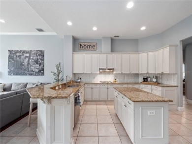 Welcome to this beautifully maintained home in the guard-gated on The Legacy Club At Alaqua Lakes in Florida - for sale on GolfHomes.com, golf home, golf lot