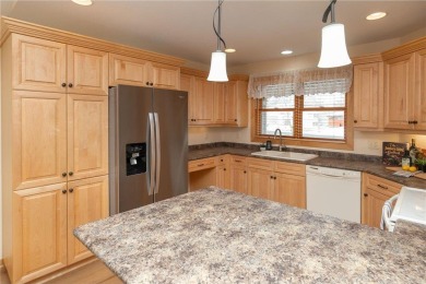 Enjoy stunning country views just steps from the Pine Island on Pine Island Golf Course in Minnesota - for sale on GolfHomes.com, golf home, golf lot
