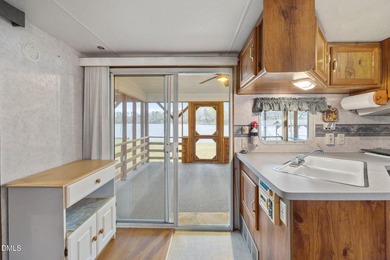 START LIVING THE LAKE LIFE NOW!! WATERFRONT GET-AWAY WITH 75 FT on River Golf and Country Club at Lake Royale in North Carolina - for sale on GolfHomes.com, golf home, golf lot