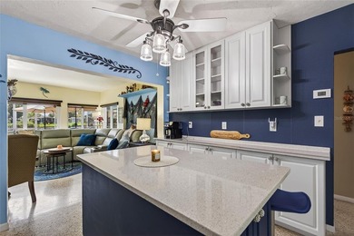 Wake up to peaceful waterfront views and glowing Gulf Coast on Jacaranda West Country Club in Florida - for sale on GolfHomes.com, golf home, golf lot