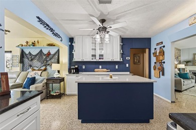 Wake up to peaceful waterfront views and glowing Gulf Coast on Jacaranda West Country Club in Florida - for sale on GolfHomes.com, golf home, golf lot