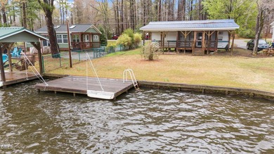 START LIVING THE LAKE LIFE NOW!! WATERFRONT GET-AWAY WITH 75 FT on River Golf and Country Club at Lake Royale in North Carolina - for sale on GolfHomes.com, golf home, golf lot