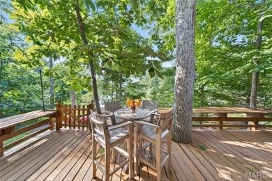 This LAKEFRONT chalet sits right on the very sought after on Innsbrook Resort Golf Course in Missouri - for sale on GolfHomes.com, golf home, golf lot