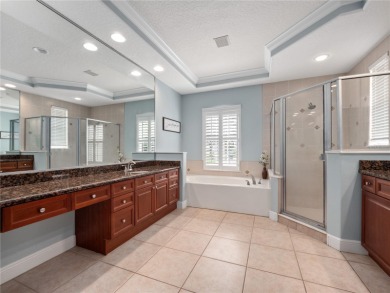 Welcome to this beautifully maintained home in the guard-gated on The Legacy Club At Alaqua Lakes in Florida - for sale on GolfHomes.com, golf home, golf lot