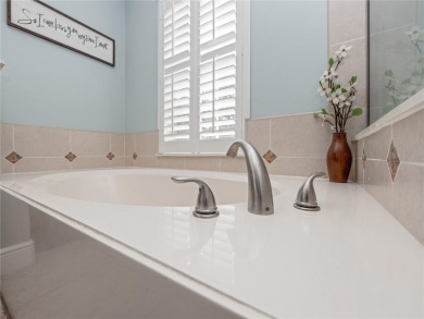 Welcome to this beautifully maintained home in the guard-gated on The Legacy Club At Alaqua Lakes in Florida - for sale on GolfHomes.com, golf home, golf lot