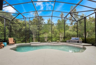 Welcome to this beautifully maintained home in the guard-gated on The Legacy Club At Alaqua Lakes in Florida - for sale on GolfHomes.com, golf home, golf lot