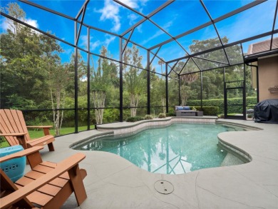 Welcome to this beautifully maintained home in the guard-gated on The Legacy Club At Alaqua Lakes in Florida - for sale on GolfHomes.com, golf home, golf lot