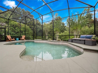 Welcome to this beautifully maintained home in the guard-gated on The Legacy Club At Alaqua Lakes in Florida - for sale on GolfHomes.com, golf home, golf lot