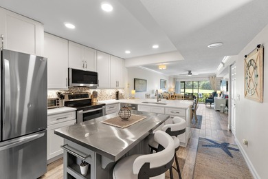 Beautifully renovated and move-in ready, this stunning home on The Golf Club of Jupiter in Florida - for sale on GolfHomes.com, golf home, golf lot