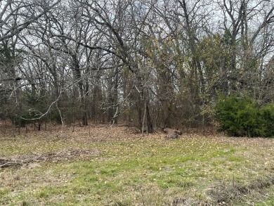 Already in place, 1200+- square foot metal workshop with a slab on Tawakoni Golf Course in Texas - for sale on GolfHomes.com, golf home, golf lot