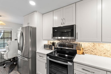 Beautifully renovated and move-in ready, this stunning home on The Golf Club of Jupiter in Florida - for sale on GolfHomes.com, golf home, golf lot