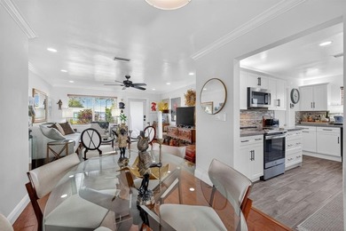 Beautifully renovated 2BR/2BA single-family home with NEW solar on Leisureville Community Association in Florida - for sale on GolfHomes.com, golf home, golf lot