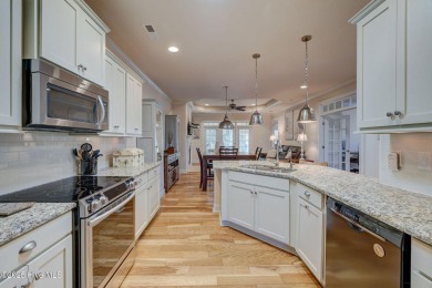 Beautifully crafted brick home situated in the Ashwood on Cape Fear National At Brunswick Forest in North Carolina - for sale on GolfHomes.com, golf home, golf lot