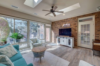 Beautifully crafted brick home situated in the Ashwood on Cape Fear National At Brunswick Forest in North Carolina - for sale on GolfHomes.com, golf home, golf lot